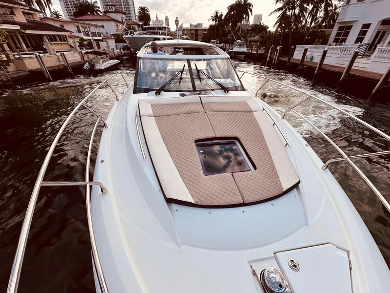 Slide: The Image of 2017 Jeanneau Leader 40 yacht docked in a scenic marina setting. - 31