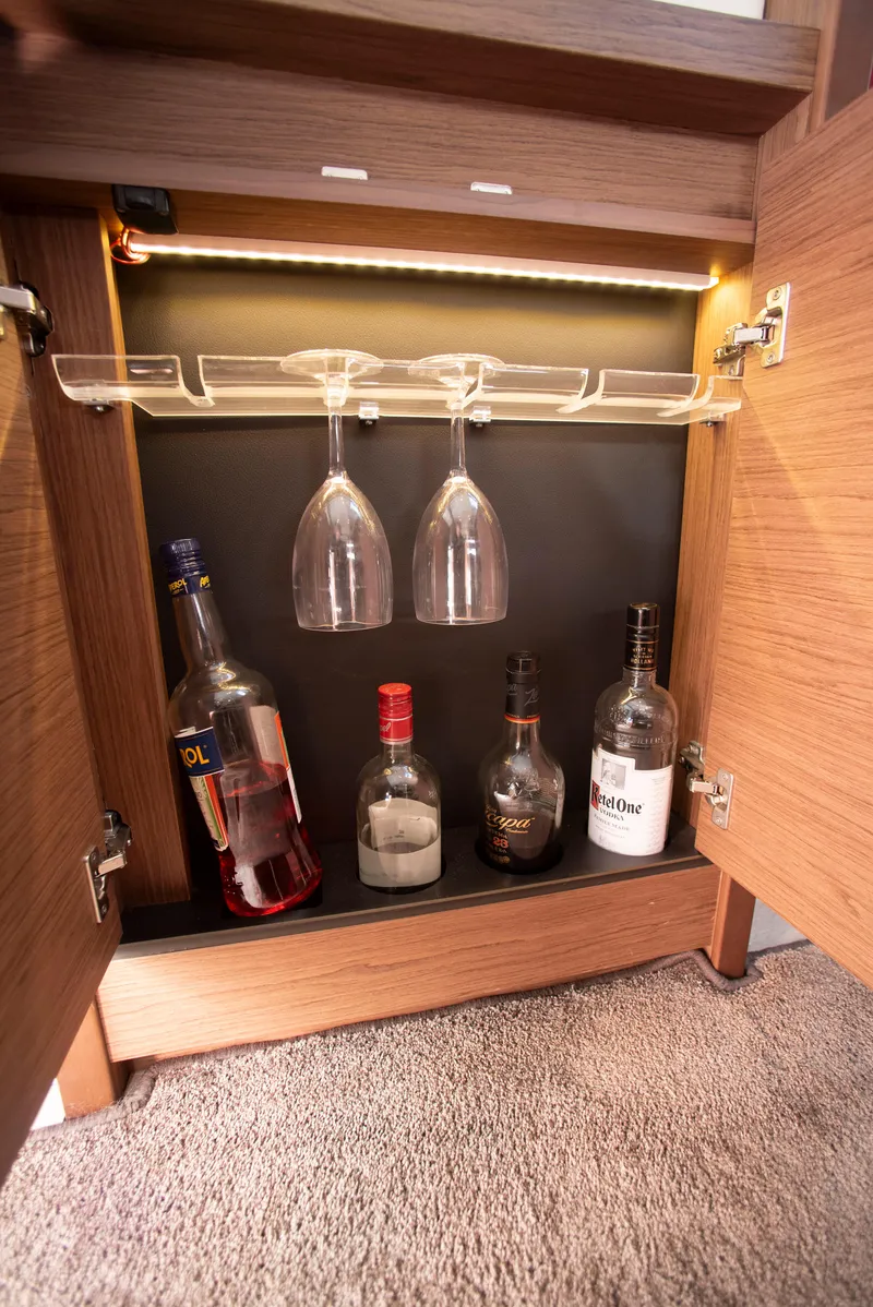 Slide: The Image of Bar cabinet with glasses and bottles in 2017 Jeanneau Leader 40 yacht. - 32