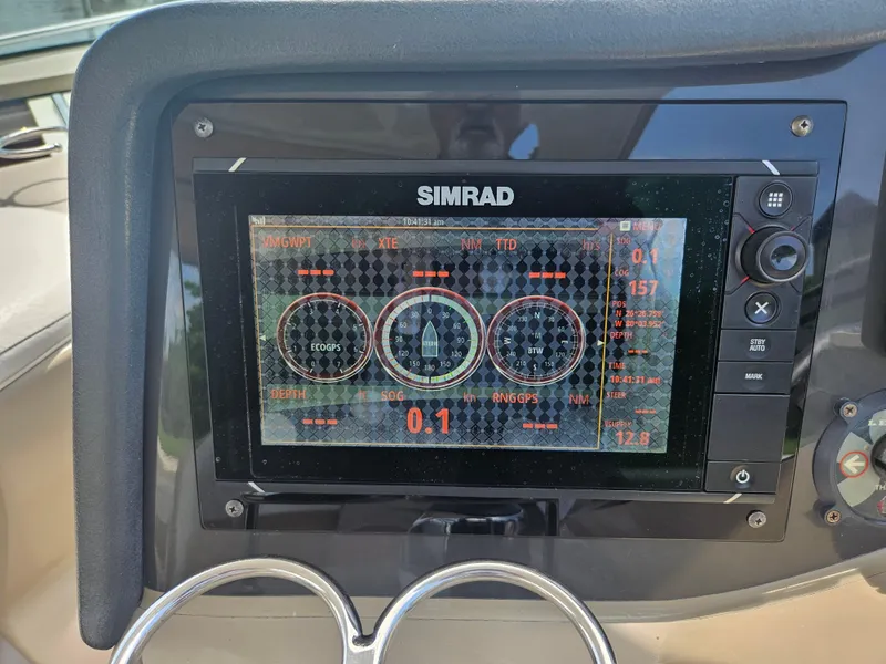 Slide: The Image of Simrad navigation display on 2005 Four Winns 378 Vista boat dashboard. - 23