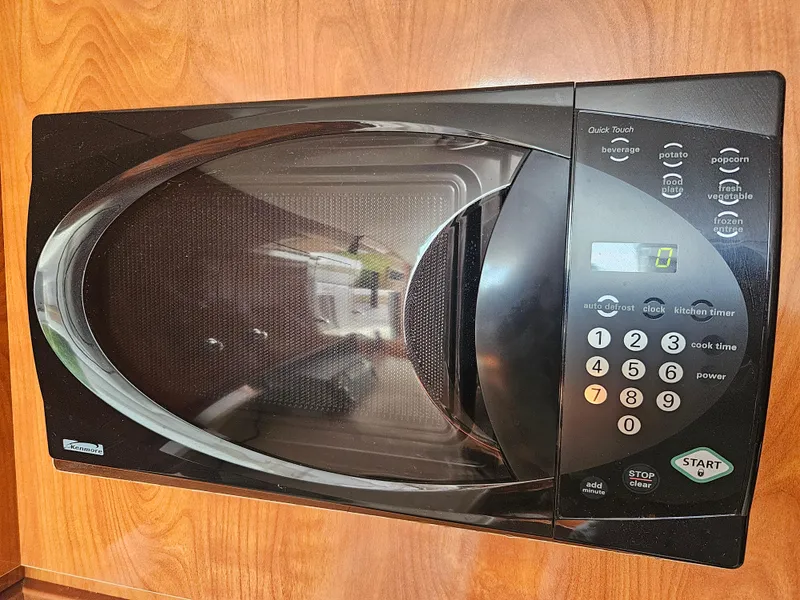 Slide: The Image of Built-in microwave in 2005 Four Winns 378 Vista boat kitchen. - 38