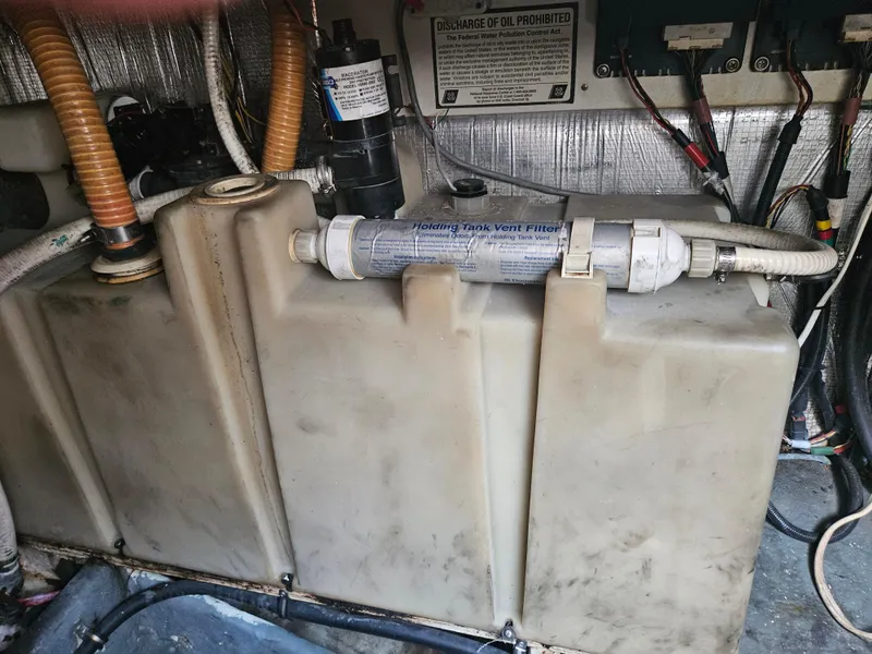 Slide: The Image of Engine compartment of 2005 Four Winns 378 Vista boat showing fuel tank and vent filter. - 42