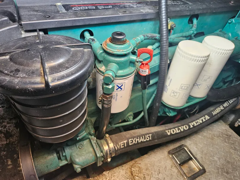 Slide: The Image of Engine compartment of a 2005 Four Winns 378 Vista with Volvo Penta components. - 43