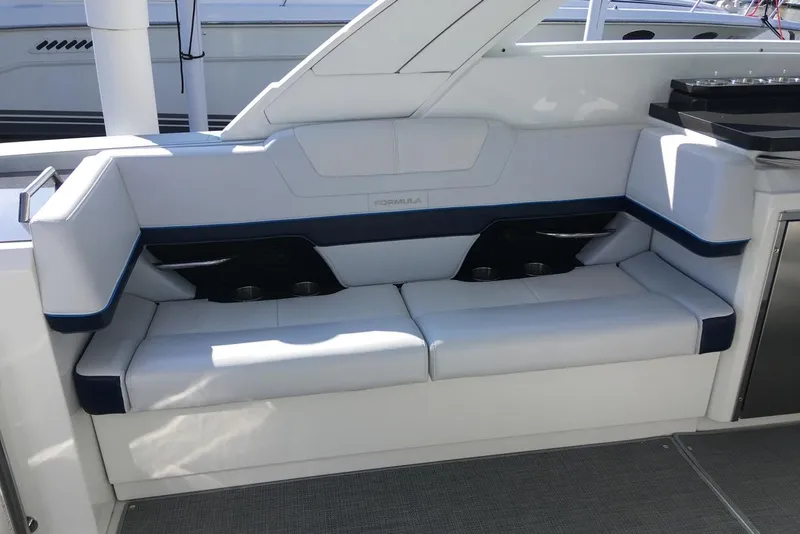 Slide: The Image of Manufacturer Provided Image: 2023 Formula 380 Super Sport Crossover OB boat interior seating area. - 16