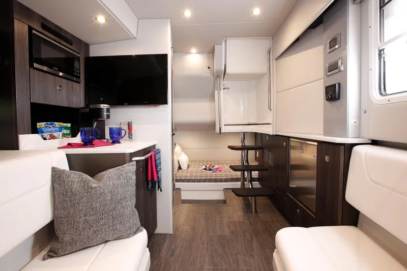 Slide: The Image of Manufacturer Provided Image: Interior of 2023 Formula 380 Super Sport Crossover OB, featuring modern kitchen and seating area. - 23