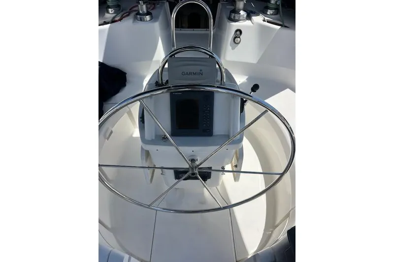 Slide: The Image of Steering wheel and navigation system on a 1997 Hunter 430 sailboat. - 12