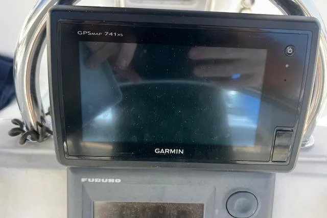 Slide: The Image of Garmin GPSMAP 741xs on 1997 Hunter 430 yacht dashboard, with Furuno equipment. - 15
