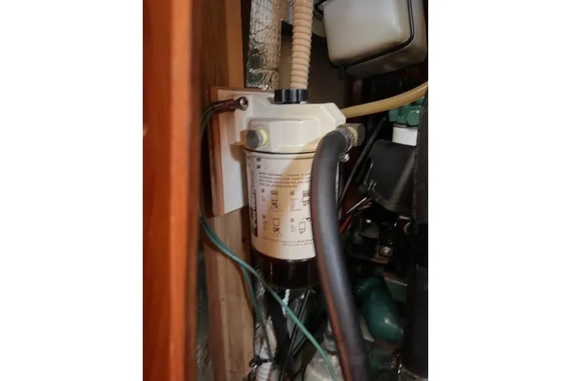 Slide: The Image of Fuel filter system in a 1997 Hunter 430 sailboat engine compartment. - 41