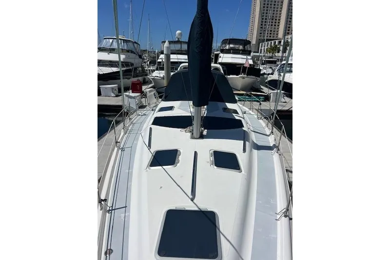 Slide: The Image of Sailboat deck view of 1997 Hunter 430, docked in a marina. - 49