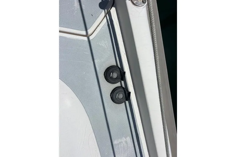 Slide: The Image of Close-up of a 1997 Hunter 430 boat deck with fittings and textured surface. - 50