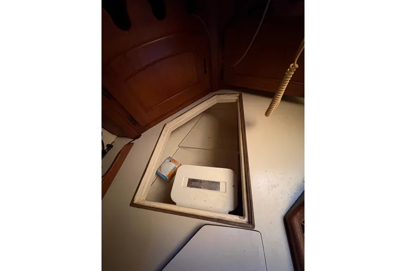 Slide: The Image of Interior storage compartment of 1978 Pacific Seacraft 31 sailboat. - 16
