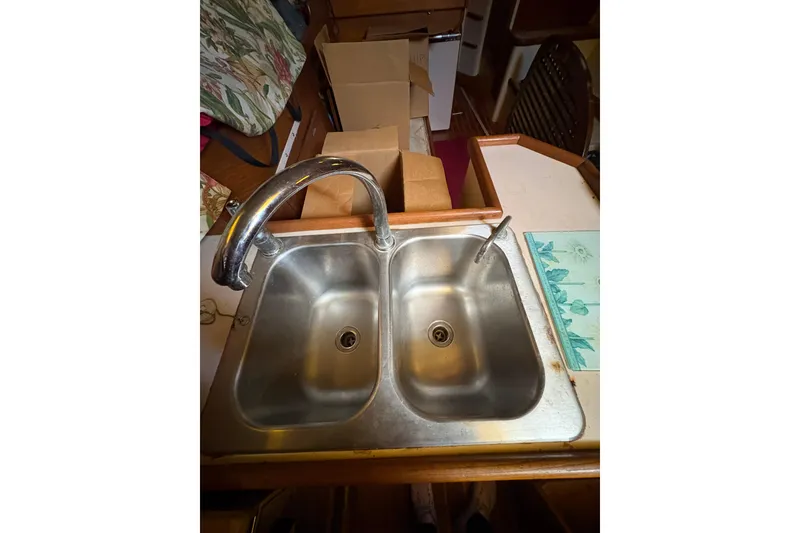 Slide: The Image of Stainless steel double sink in 1978 Pacific Seacraft 31 yacht galley. - 27