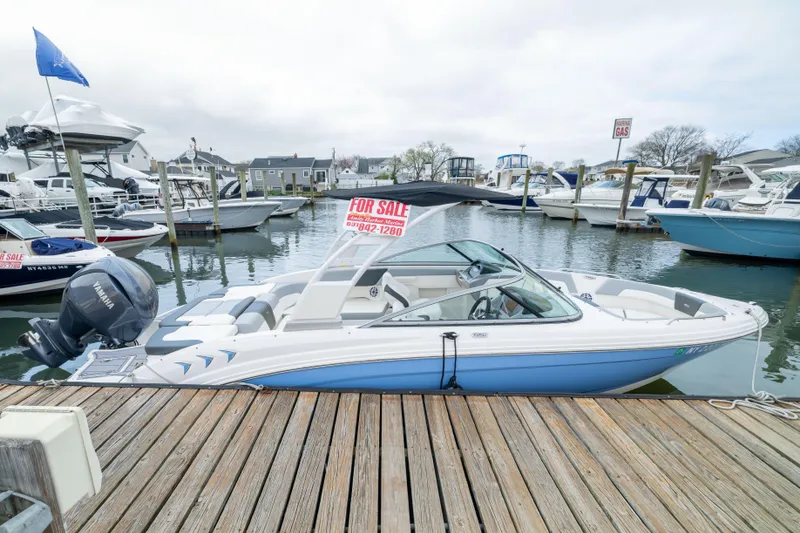 Slide: The Image of 2024 Chaparral 23 SSi OB boat for sale at marina dock. - 22