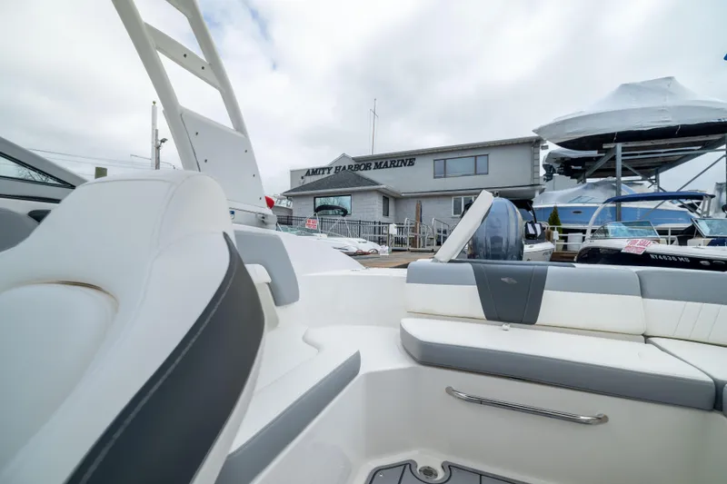 Slide: The Image of 2024 Chaparral 23 SSi OB boat interior at Amity Harbor Marine dealership. - 6
