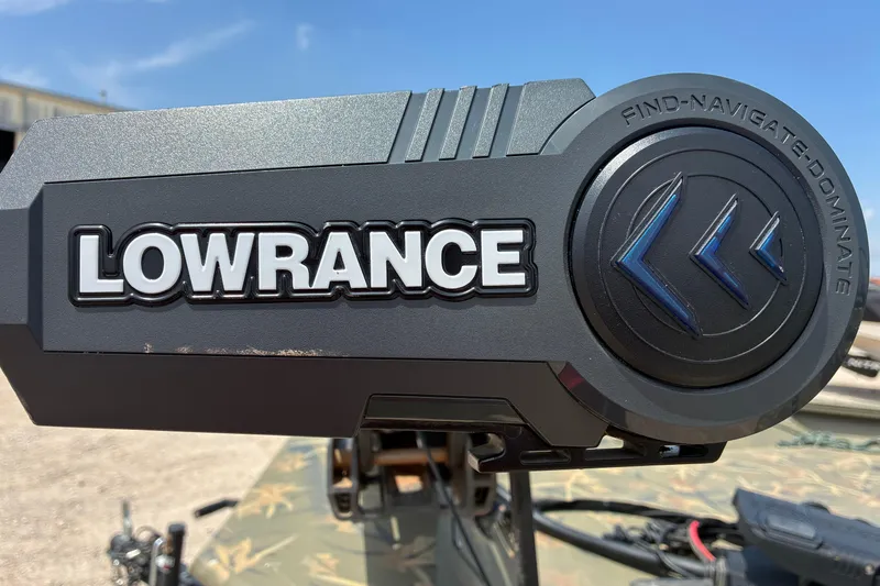 Slide: The Image of Lowrance device on 2022 Tracker Grizzly 1860 CC boat, under clear blue sky. - 10