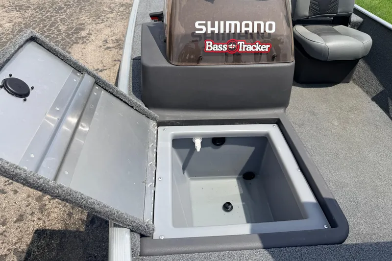 Slide: The Image of 2019 Bass Tracker III Classic boat with open storage compartment. - 18