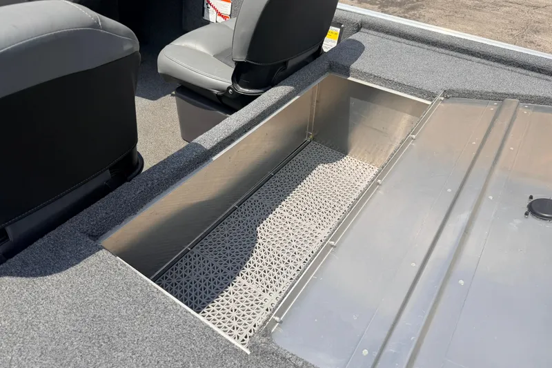 Slide: The Image of 2019 Bass Tracker III Classic boat interior with storage compartment and seating. - 23