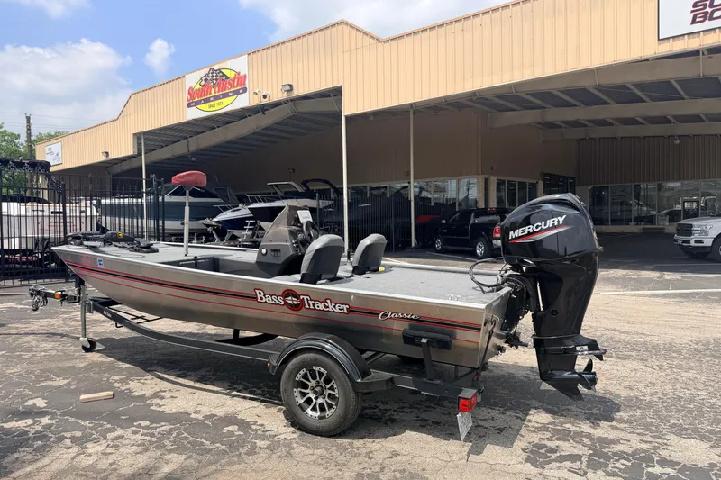 Slide: The Image of 2019 Bass Tracker III Classic boat with Mercury engine at dealership. - 4