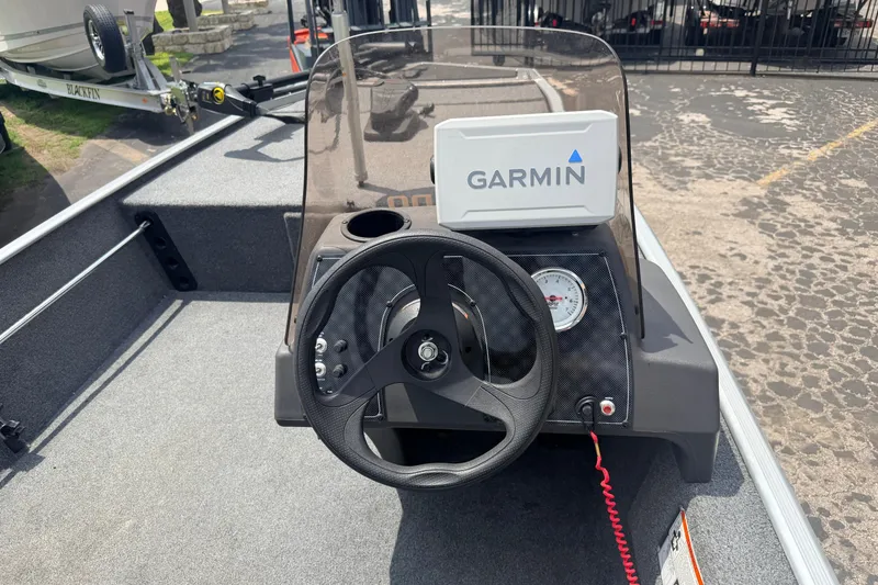 Slide: The Image of 2019 Bass Tracker III Classic boat dashboard with Garmin navigation system. - 6