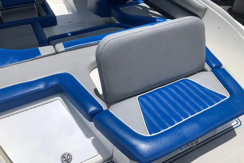 Slide: The Image of Blue and gray seating on 2021 Cobalt CS22 boat interior. - 16