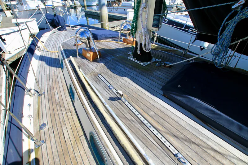 Slide: The Image of 1981 Ta-Shing Panda 40 sailboat deck with wooden finish and nautical equipment. - 14