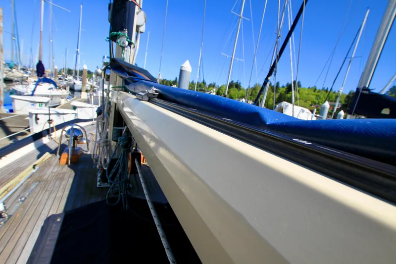 Slide: The Image of 1981 Ta-Shing Panda 40 sailboat docked at marina, clear blue sky. - 21