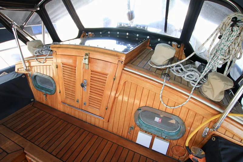 Slide: The Image of Interior of 1981 Ta-Shing Panda 40 sailboat with wooden finish and nautical equipment. - 31