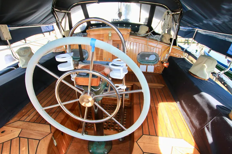 Slide: The Image of Cockpit of 1981 Ta-Shing Panda 40 sailboat with wooden deck and steering wheel. - 32