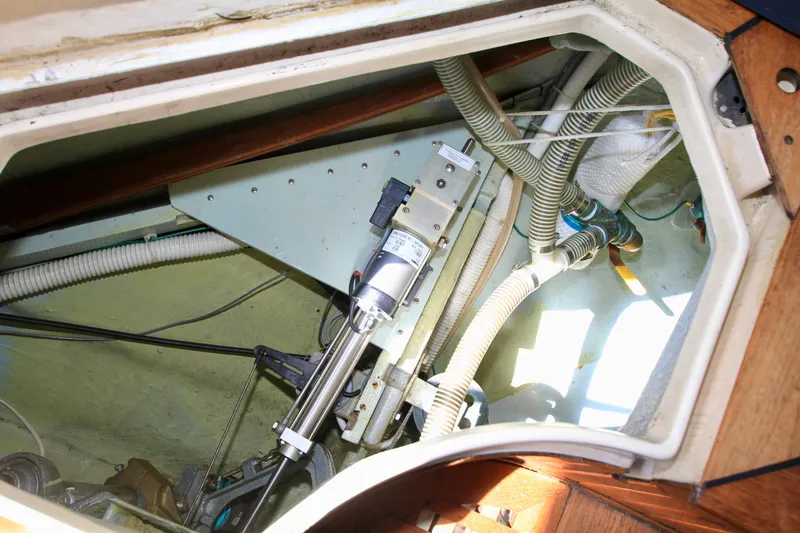 Slide: The Image of Engine compartment of 1981 Ta-Shing Panda 40 sailboat, showing mechanical and hydraulic components. - 33