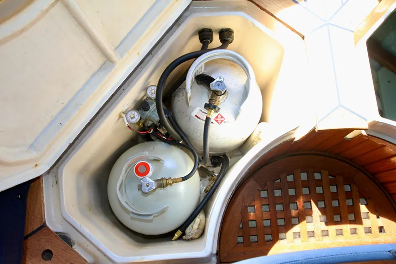 Slide: The Image of Propane tanks in storage compartment of 1981 Ta-Shing Panda 40 sailboat. - 34