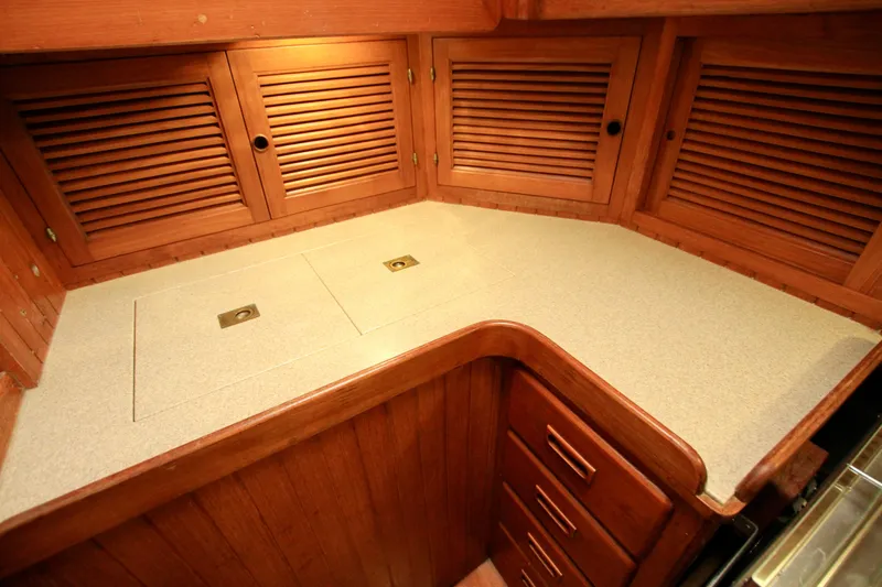 Slide: The Image of Wooden interior of 1981 Ta-Shing Panda 40 yacht with cabinets and countertop. - 44