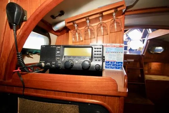 Slide: The Image of Radio equipment inside 1981 Ta-Shing Panda 40 yacht cabin with wooden interior. - 53