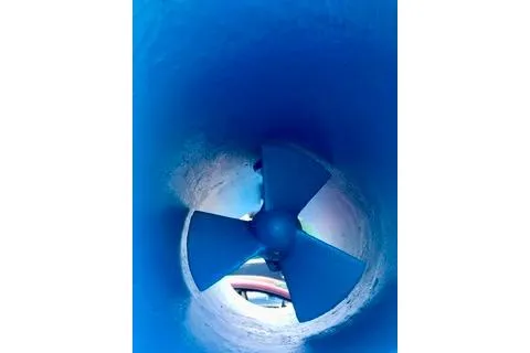 Slide: The Image of Close-up of a blue propeller inside a Ta-Shing Panda 40, 1981 model. - 76