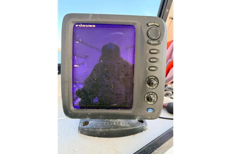Slide: The Image of Furuno marine display on a 1997 H&H Marine 38 boat, showing reflection. - 29