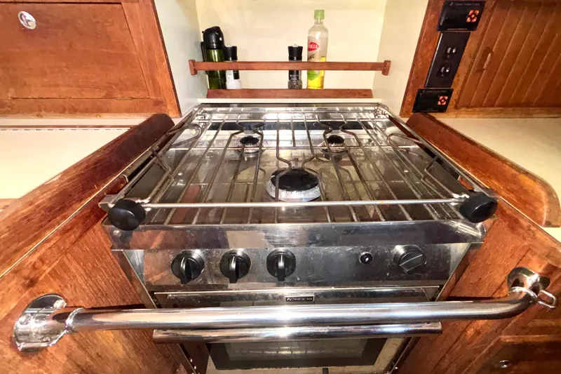 Slide: The Image of Stainless steel stove in 2002 Island Packet 380 yacht kitchen. - 15