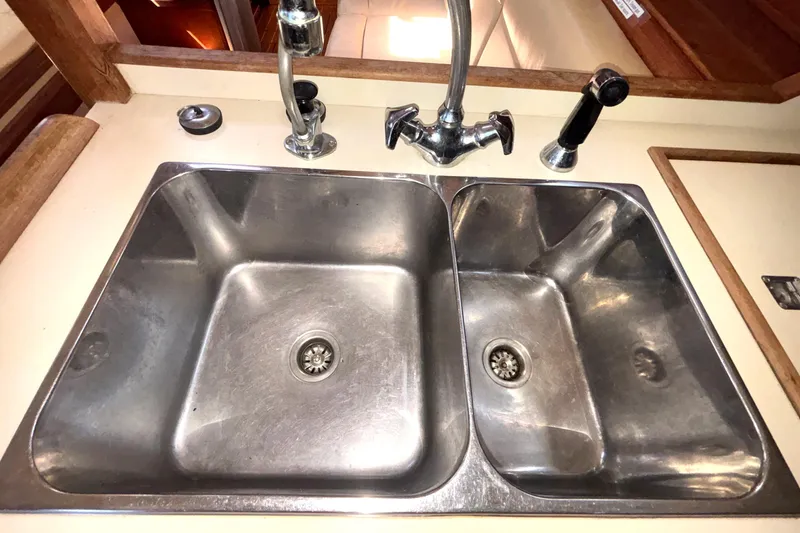 Slide: The Image of Stainless steel double sink in 2002 Island Packet 380 yacht kitchen. - 16