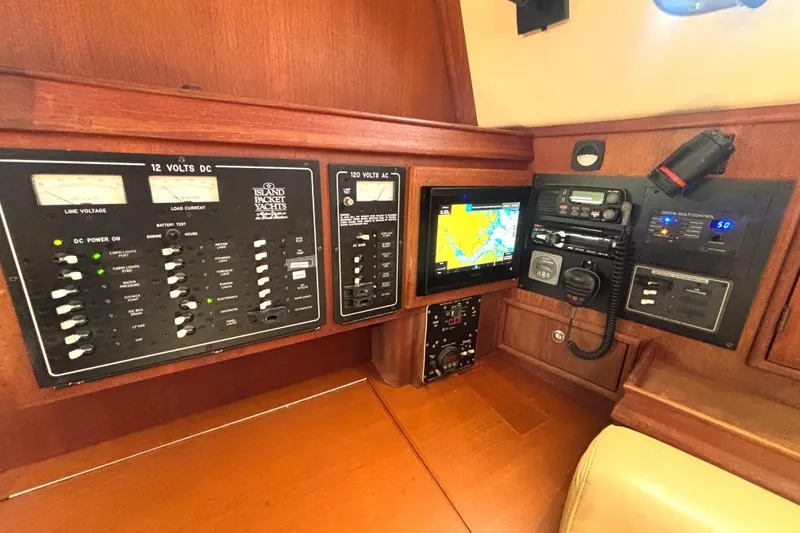 Slide: The Image of Control panel of a 2002 Island Packet 380 yacht with navigation and communication systems. - 18