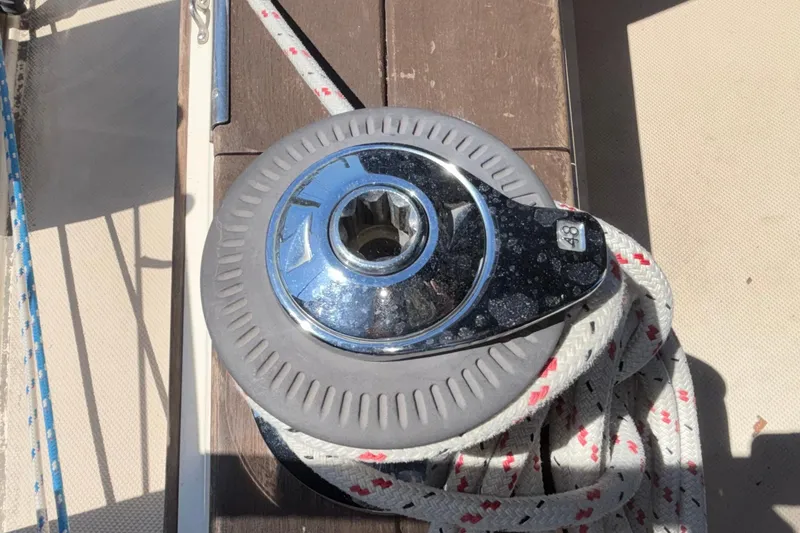 Slide: The Image of Winch on 2002 Island Packet 380 sailboat with coiled rope. - 41