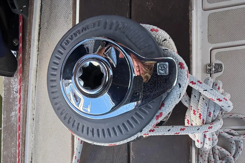Slide: The Image of Close-up of a winch on a 2002 Island Packet 380 sailboat deck. - 45