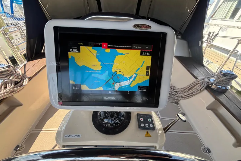 Slide: The Image of Garmin navigation system on 2002 Island Packet 380 sailboat cockpit. - 47