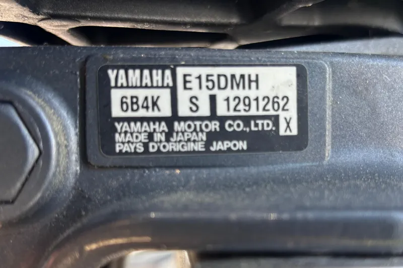 Slide: The Image of Yamaha motor label on Island Packet 380, 2002 model, showing serial and model numbers. - 51