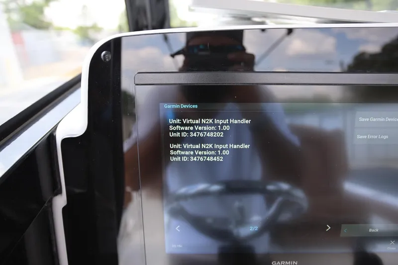 Slide: The Image of Garmin device display on 2024 Sea Hunt Ultra 275 SE boat, showing software version details. - 20