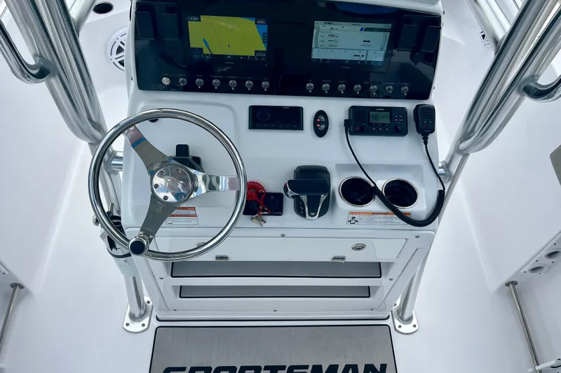 Slide: The Image of 2023 Sportsman Open 232 Center Console dashboard with steering wheel and navigation displays. - 20