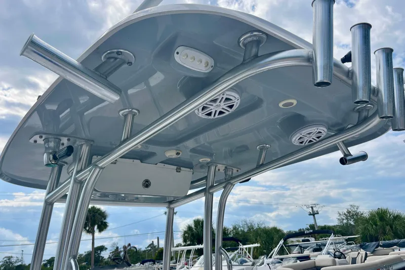 Slide: The Image of 2023 Sportsman Open 232 Center Console T-top with rod holders and speakers. - 26