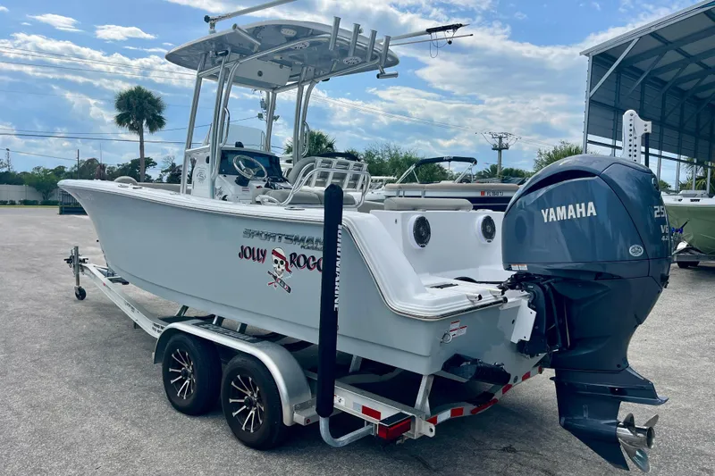 Slide: The Image of 2023 Sportsman Open 232 Center Console boat with Yamaha engine on trailer. - 4