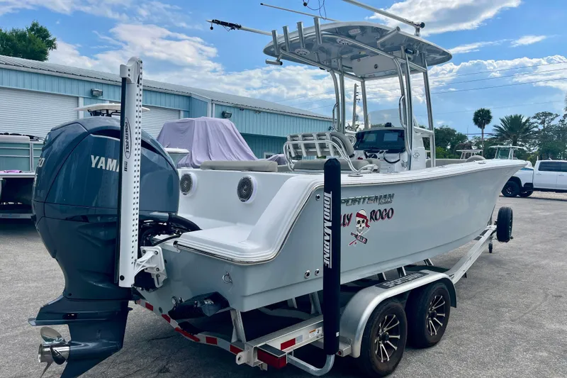 Slide: The Image of 2023 Sportsman Open 232 Center Console boat on trailer with Yamaha engine. - 6