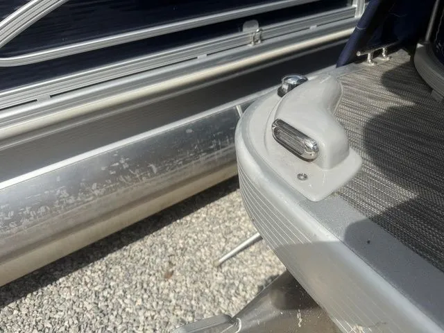 Slide: The Image of Close-up of a 2021 Bennington 168 SLV boat part on gravel. - 11