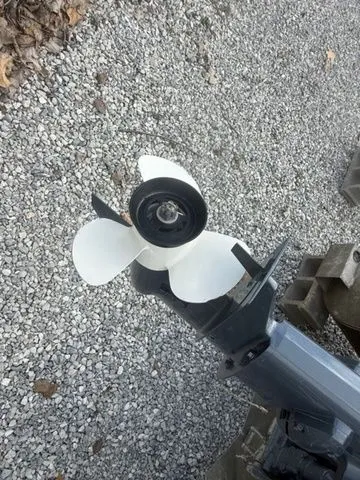 Slide: The Image of Bennington 168 SLV 2021 boat motor with propeller on gravel. - 7