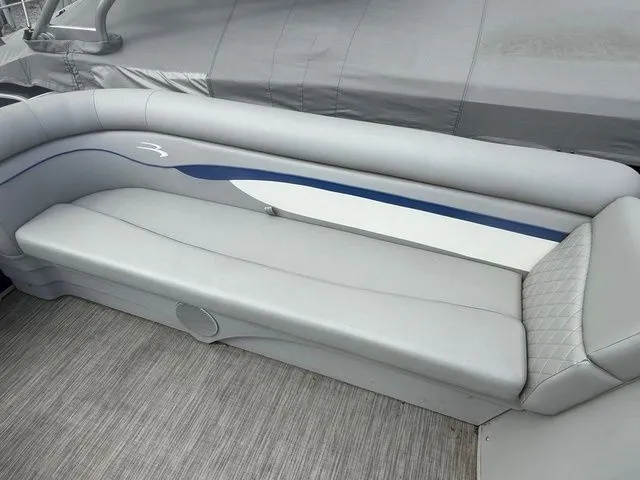 Slide: The Image of Gray seating on a 2021 Bennington 168 SLV pontoon boat. - 8