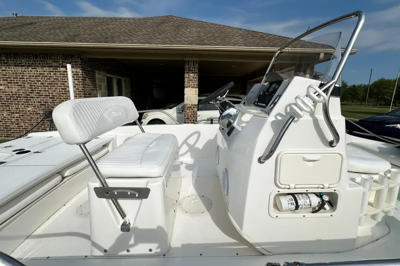 Slide: The Image of 2008 Boston Whaler 180 Dauntless boat interior with steering console and seating. - 14