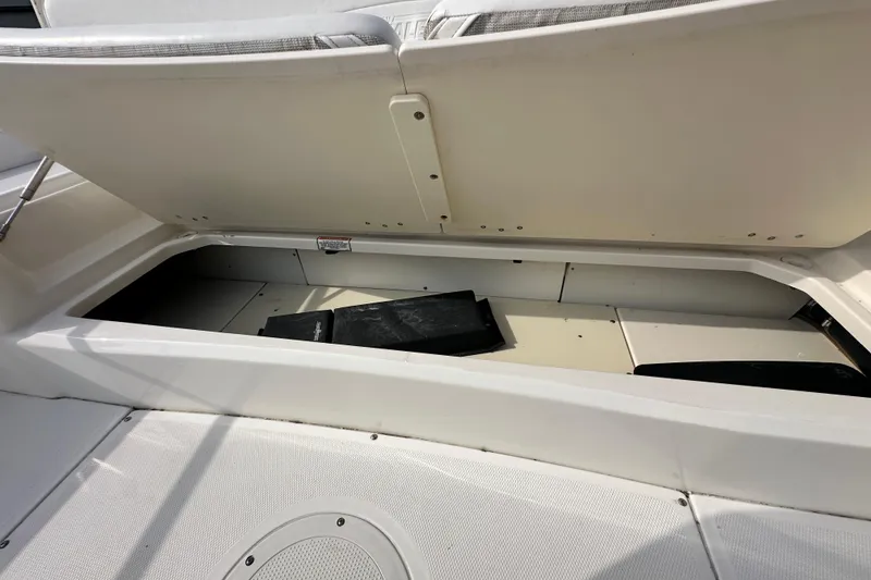 Slide: The Image of Open storage compartment on a 2008 Boston Whaler 180 Dauntless boat. - 43